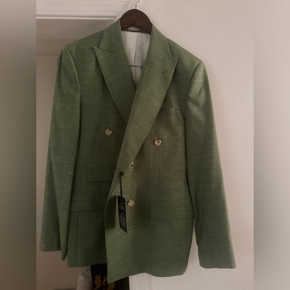 This is a custom made jacket in a size 40. Jacket has never been worn. - Picture 1 of 3